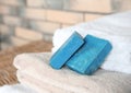 Blue handmade soap bars on clean towels