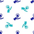 Blue Hands with animals footprint icon isolated seamless pattern on white background. Pet paw in heart. Love to the Royalty Free Stock Photo