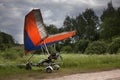 A blue hang-glider staying on a ground Royalty Free Stock Photo