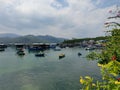 The blue harbour with the moored yachts, fishing boats