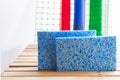 Blue harmless sponges from cellulose with detergents. Healthy washing dishes