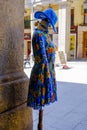 A blue hat and dress in Calle de Toleldo, Plaza Mayor Madrid