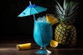 Blue Hawaiian cocktail made with blue curacao, pineapple juice, cream of coconut and white rum