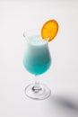 Blue Hawaiian cocktail with a slice of orange Royalty Free Stock Photo