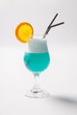 Blue Hawaiian cocktail with a slice of orange Royalty Free Stock Photo