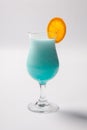 Blue Hawaiian cocktail with a slice of orange Royalty Free Stock Photo