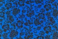 Blue Hawaiian fabric with flowers Royalty Free Stock Photo