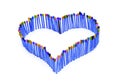 A blue heart shape made of multicolored matchsticks