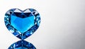 Blue heart shaped diamond on white background and copy space on a side Royalty Free Stock Photo