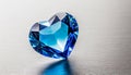 Blue heart shaped diamond on white background and copy space on a side Royalty Free Stock Photo