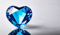 Blue heart shaped diamond on white background and copy space on a side Royalty Free Stock Photo