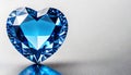 Blue heart shaped diamond on white background and copy space on a side Royalty Free Stock Photo