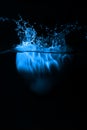 Blue heart splashing on water Royalty Free Stock Photo