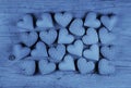 Blue hearts on an old wooden background: greeting card for fathers day.