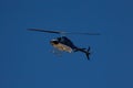Blue helicopter in flight Royalty Free Stock Photo