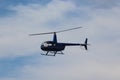 Blue Helicopter Flying through the Sky Royalty Free Stock Photo