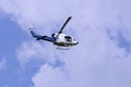 Blue helicopter in the sky Royalty Free Stock Photo