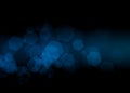 Blue hexagon bokeh on black background blurred light. Royalty Free Stock Photo