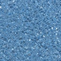Blue hexagonal tiles, glossy and reflective, arranged in a seamless pattern. The surface Royalty Free Stock Photo