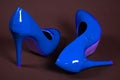 Blue high heels shoes on dark background Royalty Free Stock Photo
