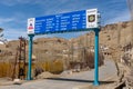 Blue highway sign with mileage to cities in northern India Royalty Free Stock Photo