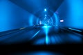 Blue highway tunnel at night . Motion blur