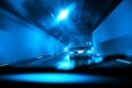 Blue highway tunnel at night . Motion blur Royalty Free Stock Photo