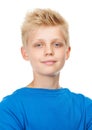 Blue is his favorite color. Studio portrait of a blond teenage boy against a white background. Royalty Free Stock Photo