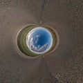 blue hole sphere little planet inside aspalt surface round frame background