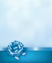 Blue holiday background with gift glossy bow and ribbon. Royalty Free Stock Photo