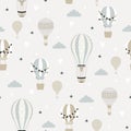 Blue hot air ballon and clouds seamless childish pattern. Hand drawn repeat pattern for wrapping, fabrik, textile or paper