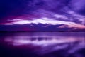 Blue hour in a lagoon. Clouds cover the sky