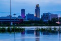 Blue hour Night scene of reflections of buildings in 2019 Missouri River flooding of Harrah`s Casino parking lot in Council Bluffs Royalty Free Stock Photo