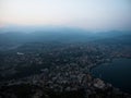 Blue hour panorama of Lugano city from Monte San Salvatore mountain hill viewpoint at Lugano lake Ticinio Switzerland Royalty Free Stock Photo