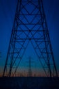 Blue hour power line towers Royalty Free Stock Photo