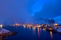 Blue Hour in Reine, Lofoten Archipelago, Norway in the winter time, water reflexion in Hamnoy Royalty Free Stock Photo