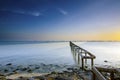 Blue hour scenery of old abandoned fisherman jetty before sunrise. Royalty Free Stock Photo