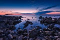 Blue hour at the sea in Sardinia west coast, Italy