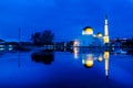 Blue hour sunrise at floating mosque with reflection. Royalty Free Stock Photo