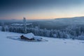 Blue hour in winter time in a remote mountain village Transylvania Romania Royalty Free Stock Photo