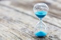 Blue hourglass background concept for deadline, urgency and countdown Royalty Free Stock Photo