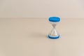 Blue hourglass on white background