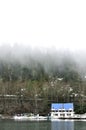 Blue house on coastline with fog in Rica, national park Abkhazia Royalty Free Stock Photo