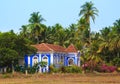 The Blue House in the coconut palm grove in Goa.