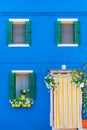 Blue house facade in the island of Burano, Venice