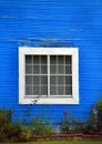 Blue House has White Framed Window Royalty Free Stock Photo