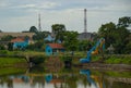 Jakarta February 2021 Blue house, trees and lake