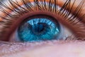 Blue human eye in a contact lens looking up close up. contact lens vision correction concept Royalty Free Stock Photo