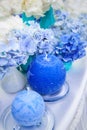 Blue hydrangeas and candles