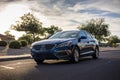 Blue Hyundai Sonata in a park on a sunny day Royalty Free Stock Photo